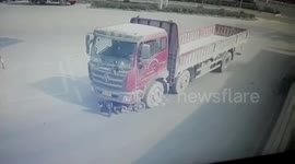 Scooter driver miraculously survives being dragged by lorry