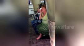 Newsflare Edit - Lady has a tantrum at Atlanta airport