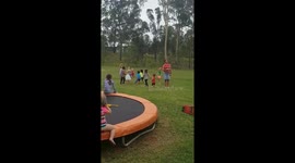 Kids attack drone with football and guitar