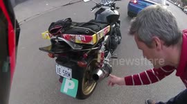 Car hits motorcycle rider
