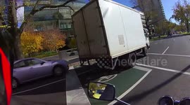 Truck drives off on red light
