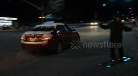 Urban skier almost gets hit by car