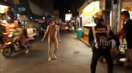 Knife-wielding naked Russian tourist caught