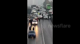 Dozens of vehicles pile-up in icy conditions in China's Xi'an