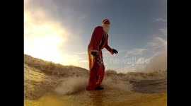 Surfing Santa on the Severn Bore