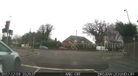 Tow truck nearly crashes  whike carrying a crashed car.