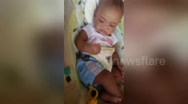 Newsflare Edit - Baby first time eating strawberry