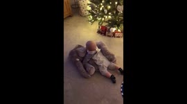 Baby watching Shrek on elephant at christmas.