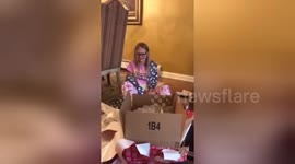 Parents surprise daughter with iPhone 7 for Christmas