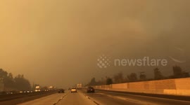 Los Angeles' Creek Fire turns skies eerie orange