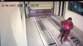 Woman trapped in parking carousel gets hit by car