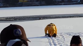 Firefighters rescue dog stuck in frozen New Jersey lake