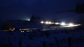 Pre-Dawn Traffic In Snow