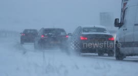Commuters battle snow on Northern Ireland's Glenshane Pass
