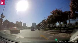 Car making turn on red light