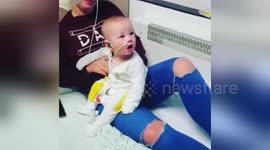 Newsflare Edit - Baby with feeding tube thinks she's eating