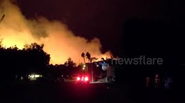 Flames Rage Over Homes - Thomas Fire - Ventura, California