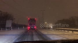 Heavy snowfall hits the UK causing treacherous conditions on the motorways