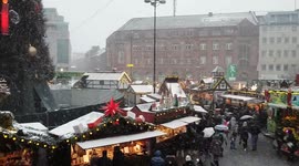 Snowing in chritsmas time, dortmund weinachtenmarkt with the biggest tree of europe