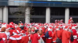 Santacon 2017: The Santa's Climbing All Over Structures In Aldgate