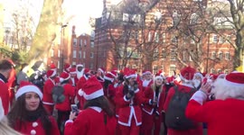Thousands of Santas dance in London