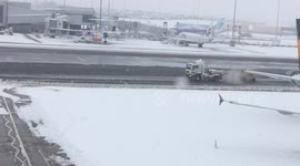 Birmingham airport snow clearing on the runway, Dec 2017