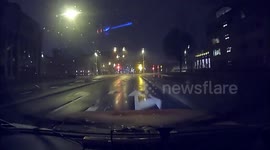 Heavy snowfall, Skid truck on highway