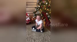 Girl bursts into tears of joy after her parents get her a puppy for Christmas