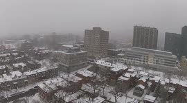 Beautiful drone footage of Montreal during snowstorm