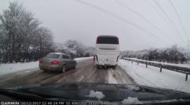 Dash-cam captures cars driving wrong way down dual carriageway in snow