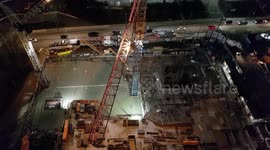 Nighttime construction of a highrise condo