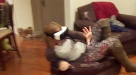 Woman screams in fear when playing virtual reality horror game