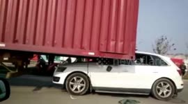 Audi Q5 crushed after driver rear-ends lorry
