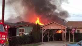 Firefighters combat flames minutes after San Diego plane crash
