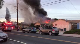 Firefighters arrive on scene of San Diego plane crash into home