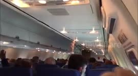 Flight attendant makes passengers sing 'happy birthday' during turbulence