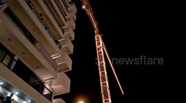 Construction cranes shine in Christmas mood in Greece