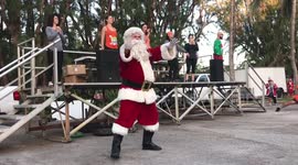 Hundreds of Santas Run In Florida Road Race