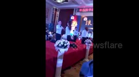 Beauty salon workers slap each other in team-building exercise
