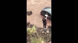 Teenager rescues tourists after car crashed into river
