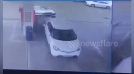 Supercar mounts vehicle at UK petrol station