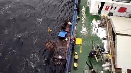 North Korean fishermen rescued from half-submerged wooden boat