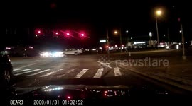 SUV runs over curb