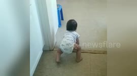 Newsflare Edit - Baby boy crawls like a monkey