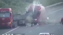 Transport lorry rear-ends broken down lorry on motorway