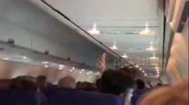 Newsflare Edit - Flight attendant makes passengers sing 'happy birthday' during turbulence