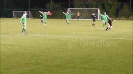 Defender drags opponent off pitch by jersey's collar