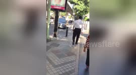 Newsflare Edit - Tourist sparks anger by graffiti tagging in broad daylight