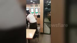Shocking footage shows McDonald's workers punching customer
