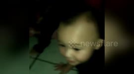 Newsflare Edit - Babies kissing